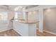 Wet bar with granite countertop and wood cabinets at 1684 E Coconino Dr, Chandler, AZ 85249