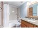 Well-maintained bathroom with a shower-tub combo, granite vanity, and ample storage, ensuring a refreshing experience at 200 E Southern Ave # 118, Tempe, AZ 85282