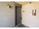 Condo entrance with a door and fire extinguisher at 200 E Southern Ave # 118, Tempe, AZ 85282