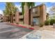 Apartment building exterior featuring brick accents and green landscaping at 200 E Southern Ave # 118, Tempe, AZ 85282