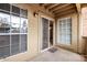 Enclosed patio with a window, screen door and concrete flooring at 200 E Southern Ave # 118, Tempe, AZ 85282