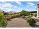 Landscaped backyard with gravel and desert plants at 20515 N 274Th Ln, Buckeye, AZ 85396