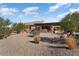 Backyard patio with pergola and desert landscaping at 20515 N 274Th Ln, Buckeye, AZ 85396