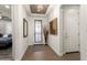 Bright entryway with tile flooring, a mirror, and a glass door at 20515 N 274Th Ln, Buckeye, AZ 85396