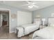 Spacious bedroom with two twin beds and ample closet space at 2144 S Yellow Wood Ave, Mesa, AZ 85209