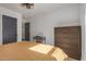 Light and airy bedroom with a dresser, closet, and ensuite bathroom access at 2218 N 8Th St, Phoenix, AZ 85006