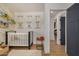 Adorable Bedroom features a crib, storage, and playful decor at 2218 N 8Th St, Phoenix, AZ 85006