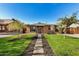 Charming brick home with a walkway leading to the entrance at 2218 N 8Th St, Phoenix, AZ 85006