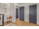 Bright hallway with gray doors and light hardwood flooring at 2218 N 8Th St, Phoenix, AZ 85006