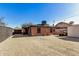 Back of house with brick exterior and yard at 2218 N 8Th St, Phoenix, AZ 85006