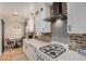 Modern white kitchen with brick backsplash, new appliances, and breakfast nook at 2218 N 8Th St, Phoenix, AZ 85006