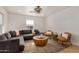 Living room with sectional sofa, armchairs, and a coffee table at 2218 N 8Th St, Phoenix, AZ 85006