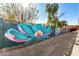 Colorful floral wall mural adds curb appeal at 2218 N 8Th St, Phoenix, AZ 85006