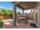 Covered patio with seating area at 22205 N Cochise Ln, Sun City West, AZ 85375