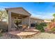 Outdoor patio with seating area and built-in grill at 22205 N Cochise Ln, Sun City West, AZ 85375