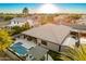 Aerial view of house with pool and backyard; landscaped grounds at 22331 N 80Th Ave, Peoria, AZ 85383