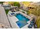 Luxury backyard with a large pool, spa, and outdoor kitchen at 22331 N 80Th Ave, Peoria, AZ 85383