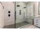 Spa-like bathroom with a large walk-in shower, built-in bench, and modern fixtures at 22331 N 80Th Ave, Peoria, AZ 85383