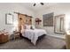 Charming bedroom with a barn door and plenty of natural light at 22331 N 80Th Ave, Peoria, AZ 85383