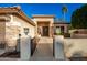 Inviting front entry with a charming stone facade and decorative door at 22331 N 80Th Ave, Peoria, AZ 85383