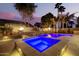 Luxury pool and spa area with fire bowls and lighting at 22331 N 80Th Ave, Peoria, AZ 85383