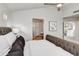 Main bedroom with an ensuite bathroom and a view of the loft area at 23575 N 75Th Pl, Scottsdale, AZ 85255