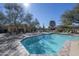 Community pool with plenty of lounge chairs for relaxing at 23575 N 75Th Pl, Scottsdale, AZ 85255