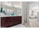 Double vanity bathroom with access to bedroom at 2891 N Westridge Ln, Casa Grande, AZ 85122