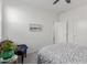 Bedroom with gray bedding and wicker chair at 2891 N Westridge Ln, Casa Grande, AZ 85122