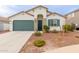 One-story home with green garage door and landscaped front yard at 2891 N Westridge Ln, Casa Grande, AZ 85122