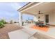 Patio features dining area and lounge chairs at 2891 N Westridge Ln, Casa Grande, AZ 85122