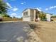 House exterior with driveway and landscaping at 2946 E Grove Cir, Mesa, AZ 85204