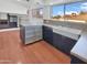 Modern kitchen with stainless steel appliances and wood flooring at 2946 E Grove Cir, Mesa, AZ 85204