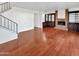 Living room with hardwood floors and fireplace at 2946 E Grove Cir, Mesa, AZ 85204