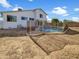 Inviting backyard pool with safety fence at 2946 E Grove Cir, Mesa, AZ 85204