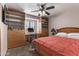 Comfortable bedroom with built-in shelves and a desk at 3146 S Stewart Cir, Mesa, AZ 85202