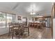 Bright dining area with a table and chairs, adjacent to the kitchen at 3146 S Stewart Cir, Mesa, AZ 85202