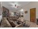 Living room offering an open floor plan and access to the dining area at 3146 S Stewart Cir, Mesa, AZ 85202