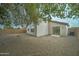 Large backyard with gravel landscaping and block wall at 33868 N Mercedes Dr, San Tan Valley, AZ 85144