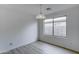 Simple dining area with a light fixture and large window at 33868 N Mercedes Dr, San Tan Valley, AZ 85144