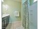 Bathroom with shower/tub combo and updated fixtures at 36148 W Seville Dr, Maricopa, AZ 85138