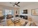 Bright entryway with neutral walls and view into an office area at 36148 W Seville Dr, Maricopa, AZ 85138