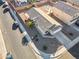 An aerial view of a house with a driveway and landscaping, showing a well-maintained property at 36509 W Nina St, Maricopa, AZ 85138