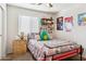 Charming bedroom with Hello Kitty decor and double bed at 36509 W Nina St, Maricopa, AZ 85138