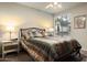 Spacious bedroom with a queen-size bed and ceiling fan at 3848 N 3Rd Ave # 1044, Phoenix, AZ 85013