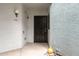 Condo entry with dark brown door and light walls at 3848 N 3Rd Ave # 1044, Phoenix, AZ 85013