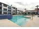 Inviting community pool with lounge chairs at 3848 N 3Rd Ave # 1044, Phoenix, AZ 85013