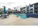 Community pool and patio area with seating at 3848 N 3Rd Ave # 1044, Phoenix, AZ 85013