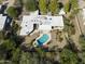 Aerial view of home with pool and landscaped yard at 3921 E San Miguel Ave, Paradise Valley, AZ 85253