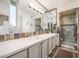 Double vanity bathroom with a walk-in shower at 3921 E San Miguel Ave, Paradise Valley, AZ 85253